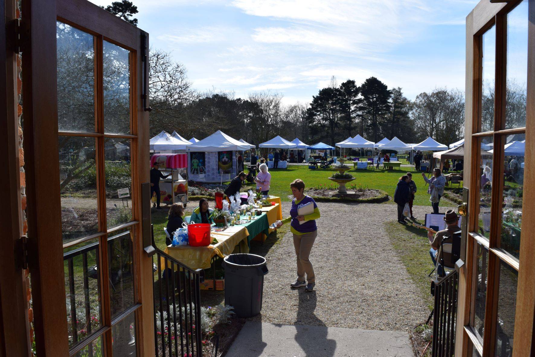 people buying herbs at sale