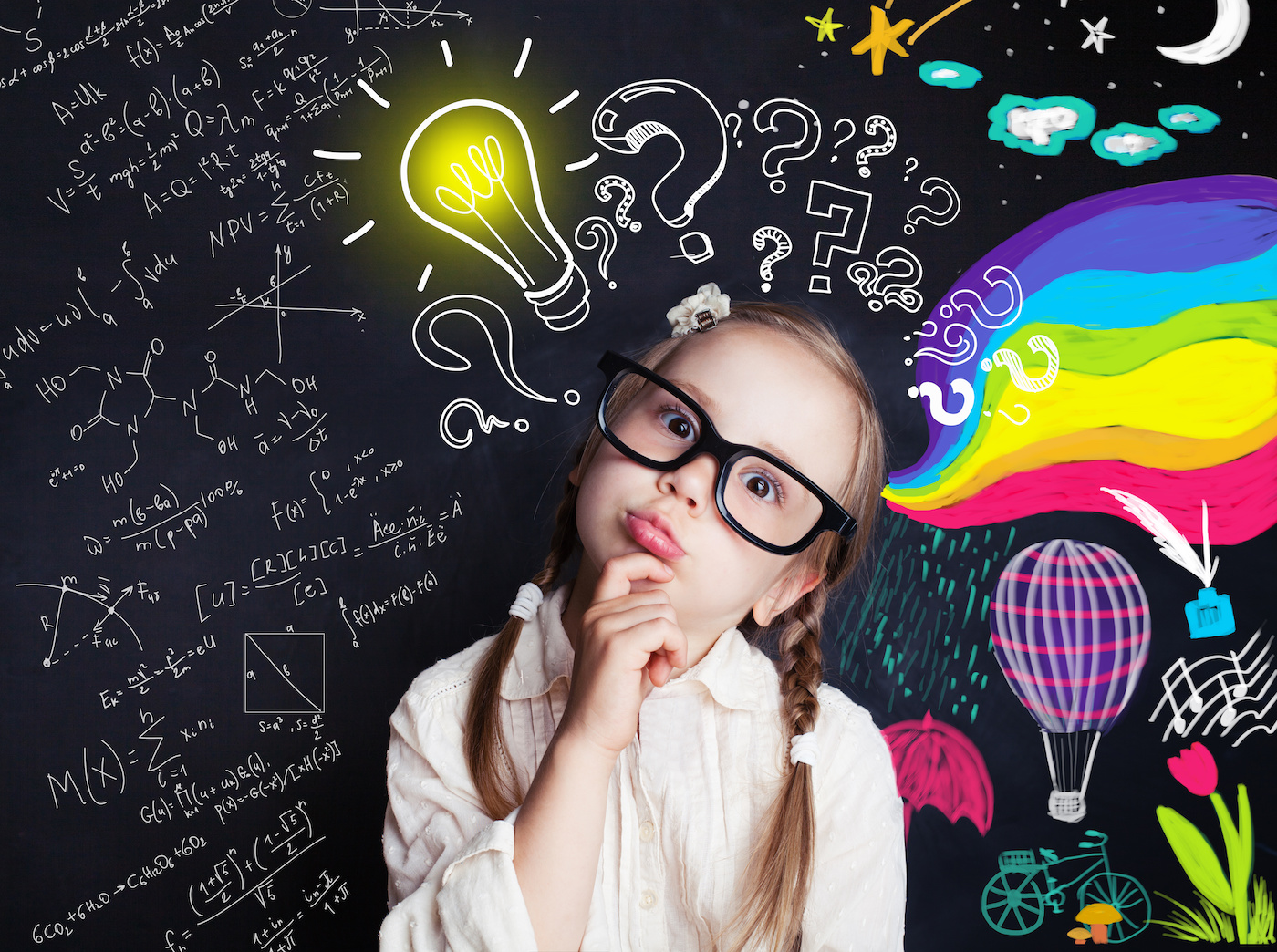 Child with thinking with brightly colored question mark graphics scattered across a black background