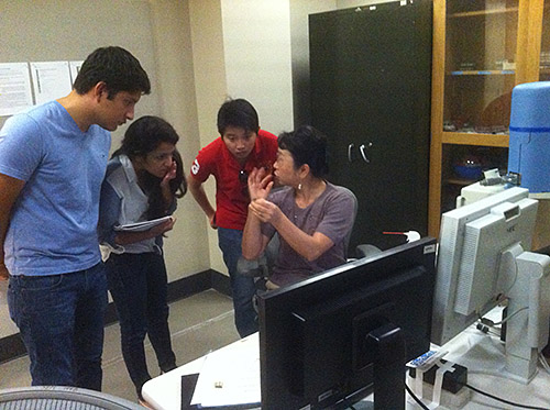 teacher and students in lab